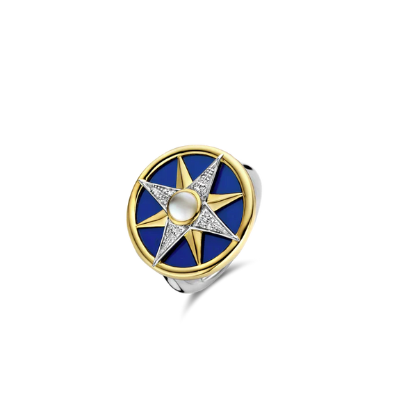 SILVER GOLD PALTED RING  MOTHER OF PEARL CENTER, YELLOW GOLD PLATING AND PAVE ON A LAPIS BLUE BACKDROP