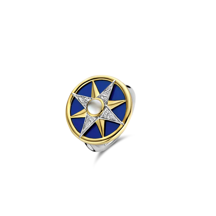 SILVER GOLD PALTED RING  MOTHER OF PEARL CENTER, YELLOW GOLD PLATING AND PAVE ON A LAPIS BLUE BACKDROP