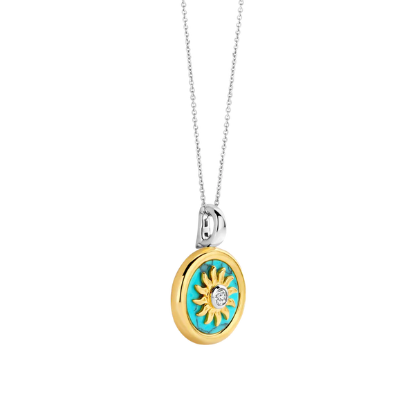 SILVER GOLD PLATED SUN HANDSET A CAPTIVATING TURQUOISE BACKDROP